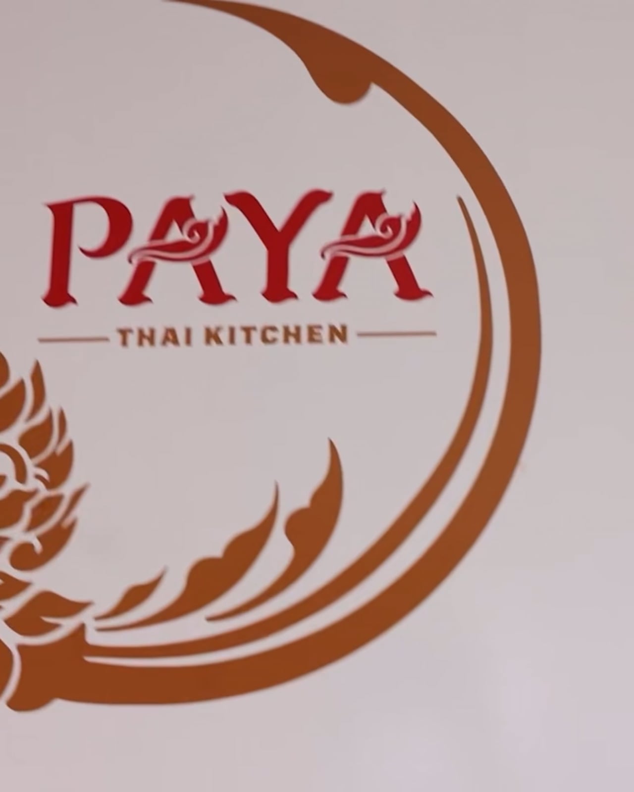 The Paya Thai Kitchen logo, a still from the restaurant’s film